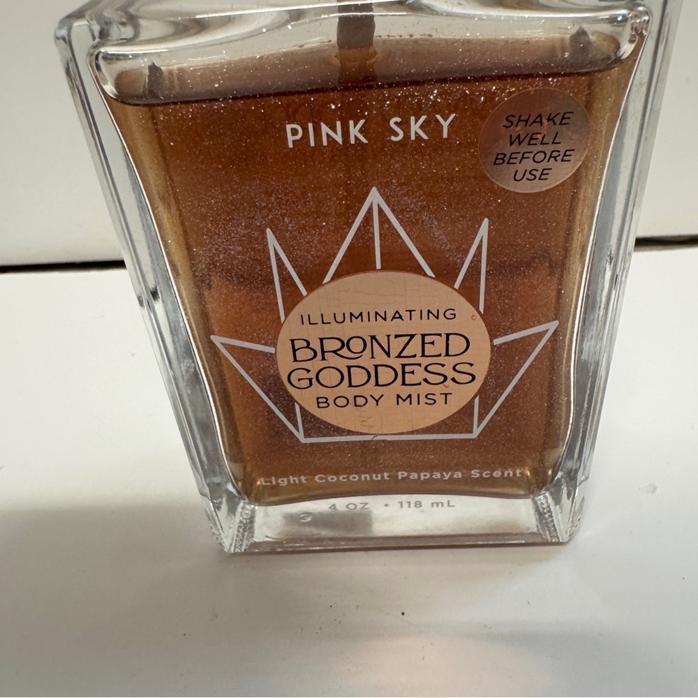 Pink Sky Illuminating Bronzed Goddes Body Mist Light Coconut Papaya 4 OZ - Picture 2 of 3